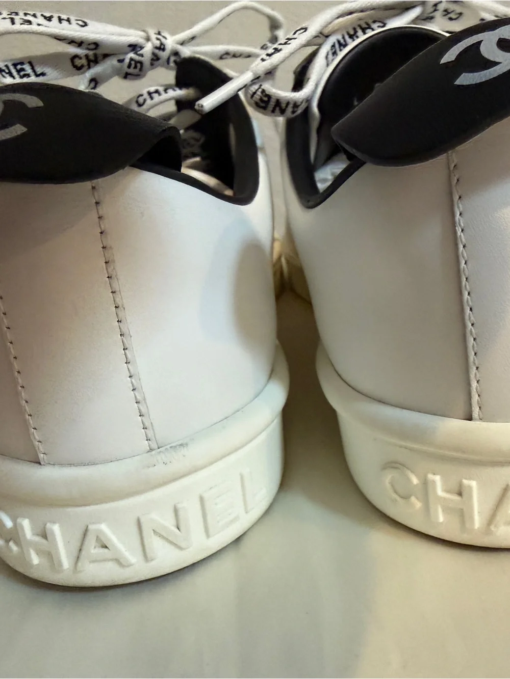 CHANEL White Leather Weekender Tennis Sneakers
